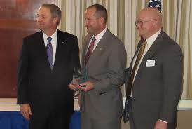 Biographymasters Men Receiving Award